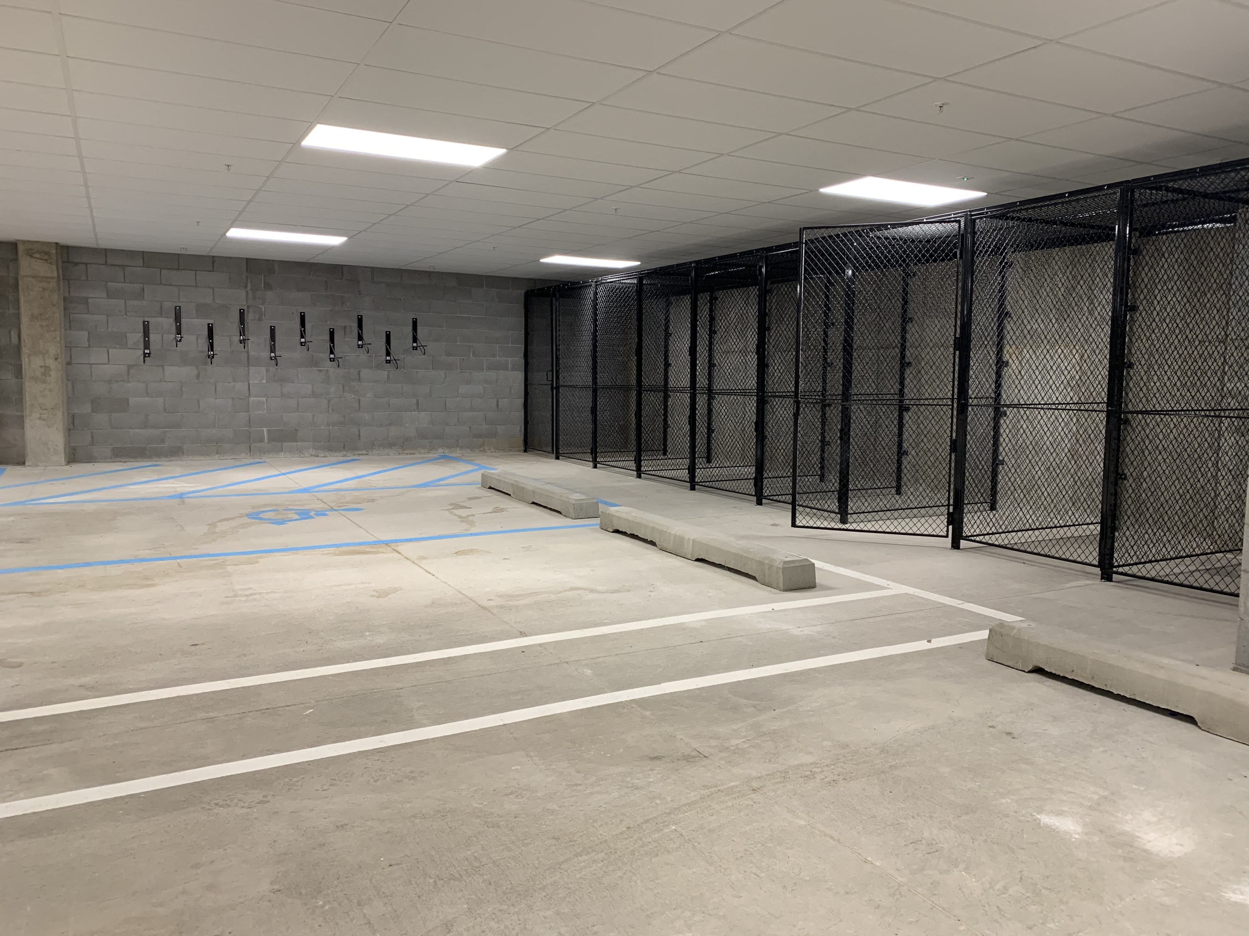 cement parking garage with storage cages